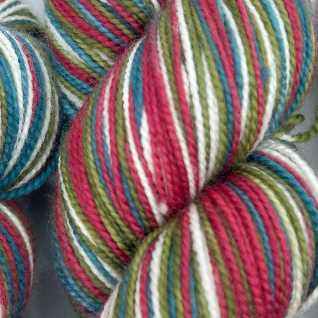 a group of colorful yarn balls