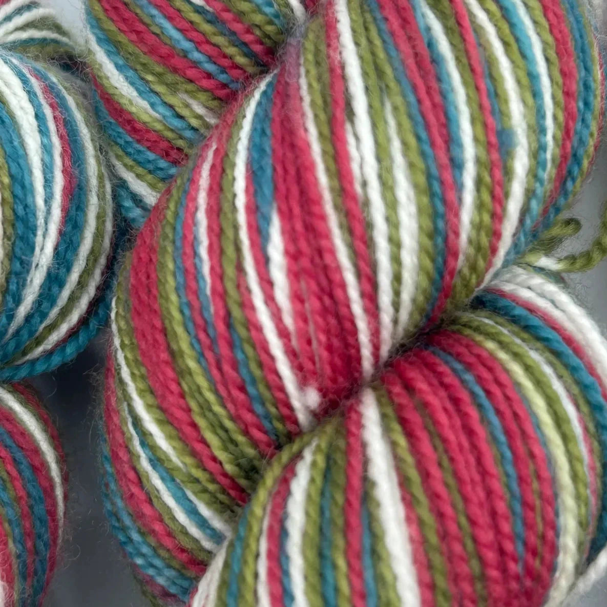 a group of colorful yarn balls