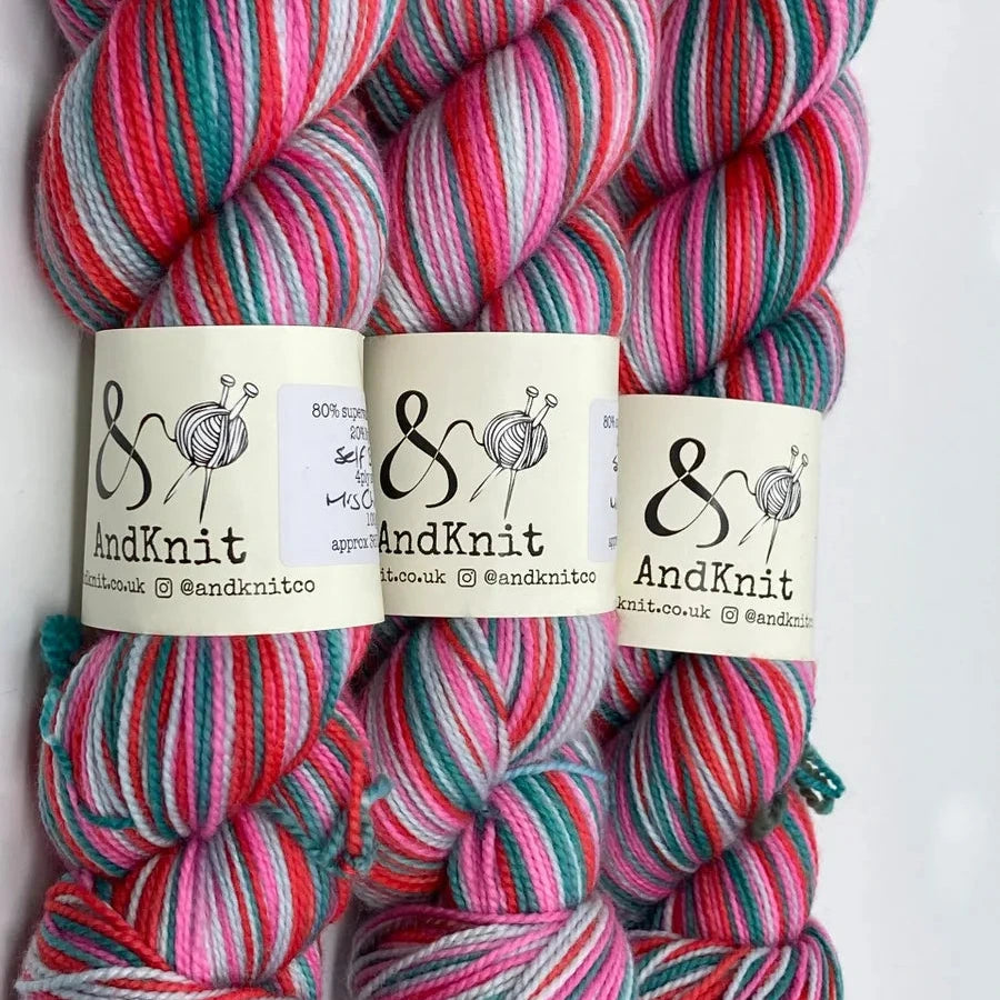 a group of colorful yarn