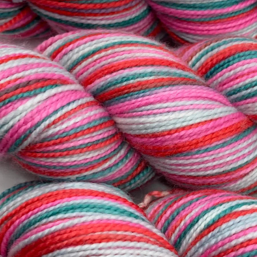 a group of colorful yarn