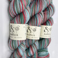 a group of yarns with labels