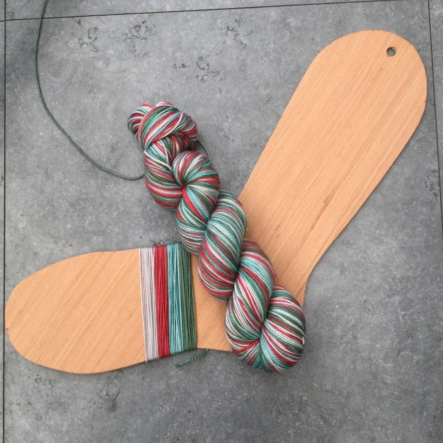a string on a wooden object