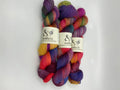 a group of colorful yarn