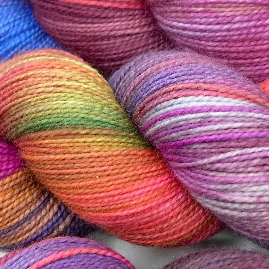 a close up of colorful yarn